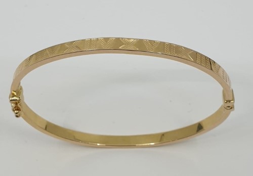 9ct gold cartier style bangle