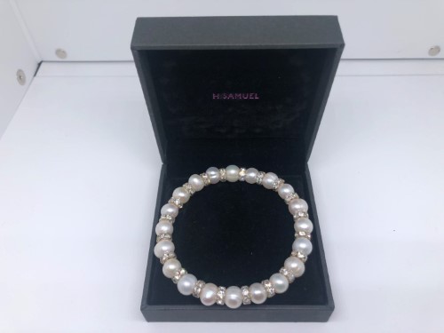 Sterling Silver Blue Topaz  Diamond Twist Bracelet Bridal Headwear and  Jewellery from HSamuel  hitchedcouk