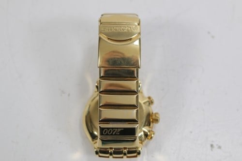 Swatch 007 clearance gold