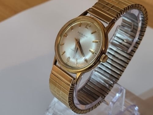 Excalibur hotsell gold watch