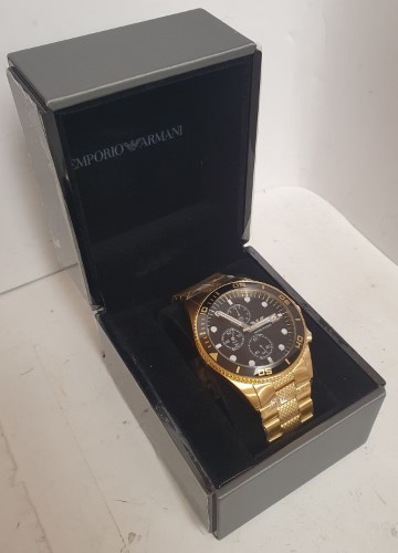 Emporio armani smartwatch clearance gold