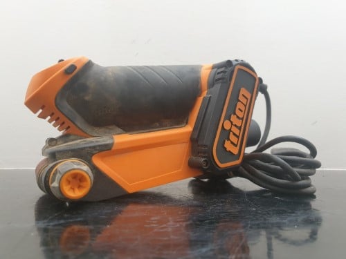 Triton tcmbs palm on sale belt sander